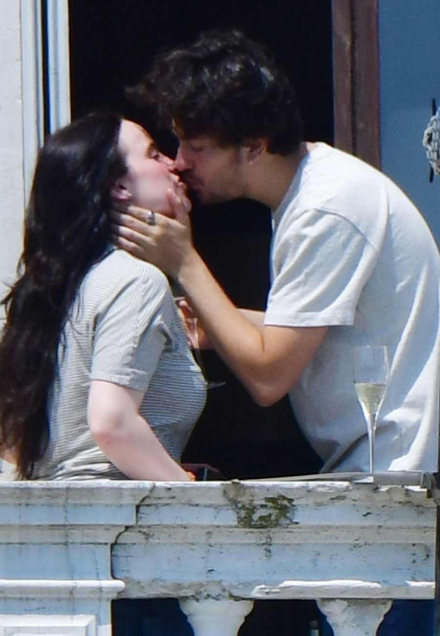 Billie Eilish and Nat Wolff Make Their Romance Official with a Steamy Balcony Kiss