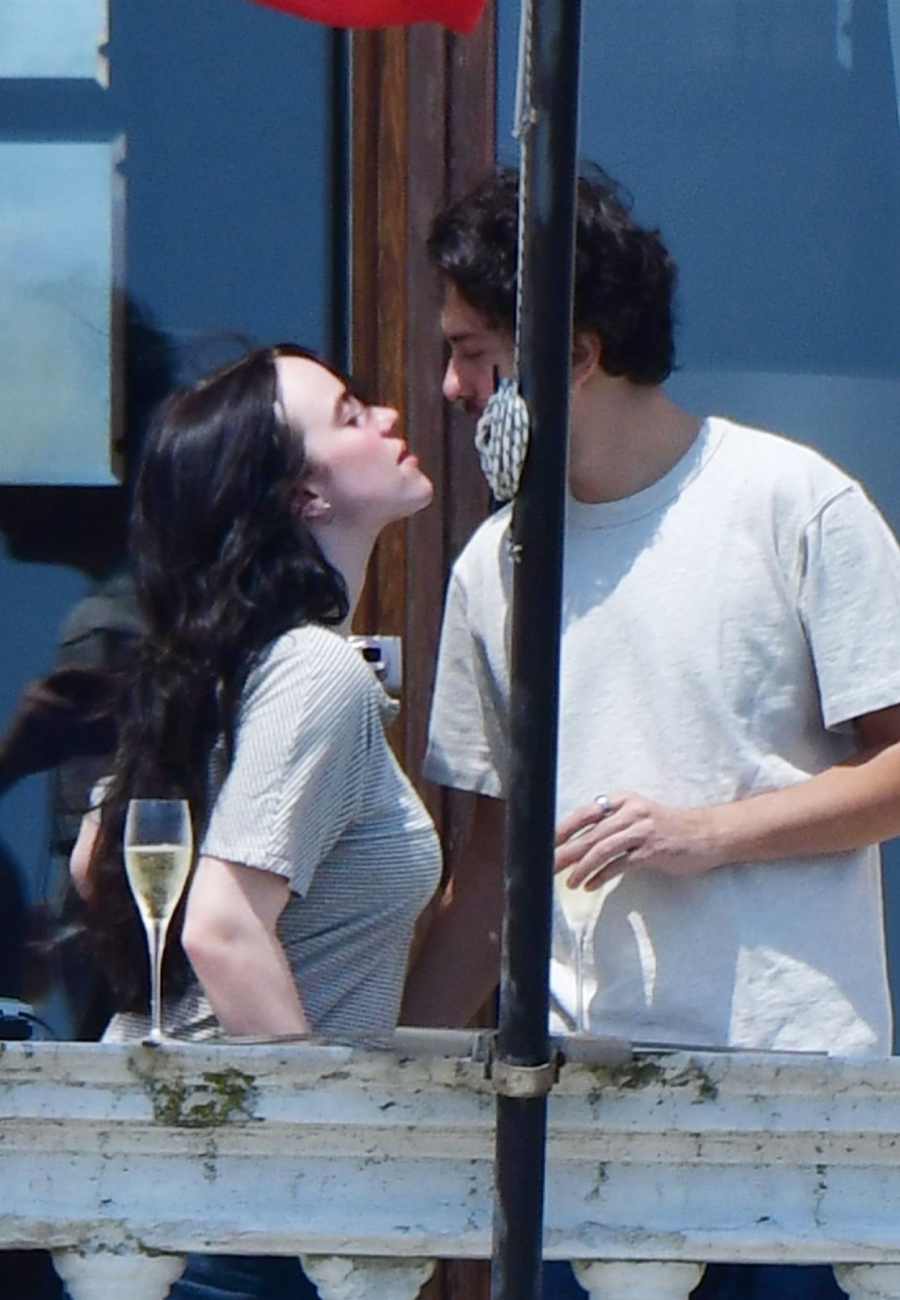 Billie Eilish and Nat Wolff Make Their Romance Official with a Steamy Balcony Kiss
