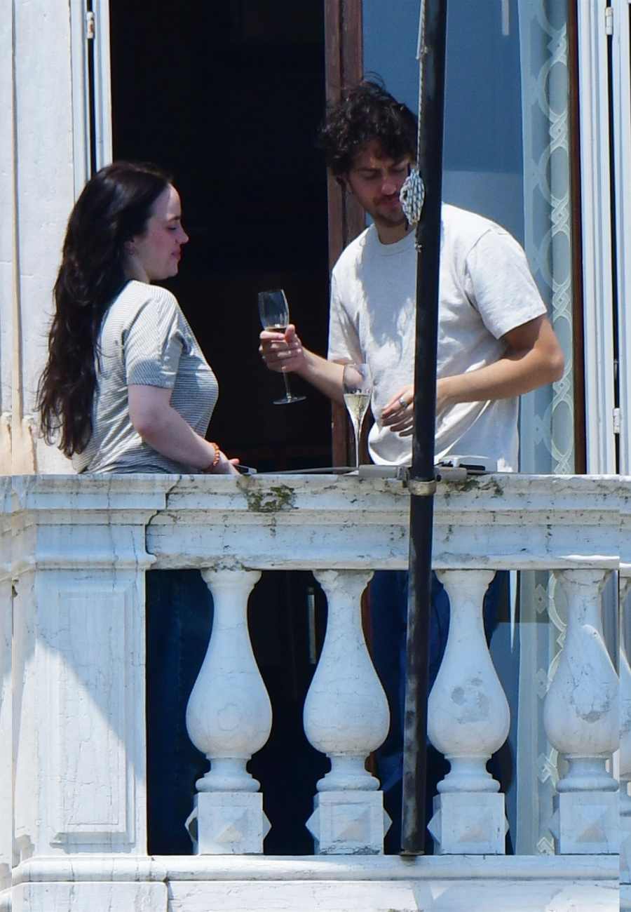 Billie Eilish and Nat Wolff Make Their Romance Official with a Steamy Balcony Kiss