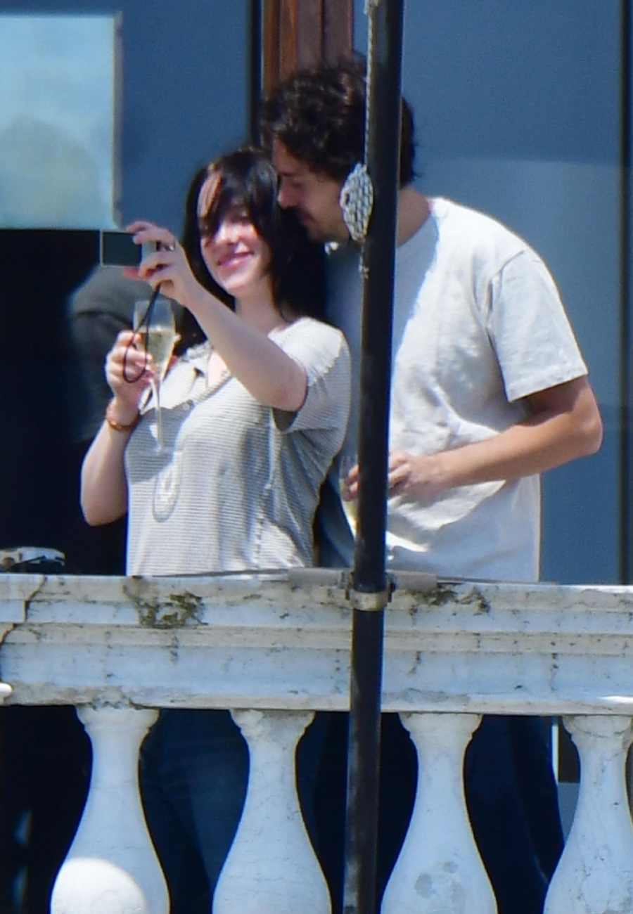 Billie Eilish and Nat Wolff Make Their Romance Official with a Steamy Balcony Kiss