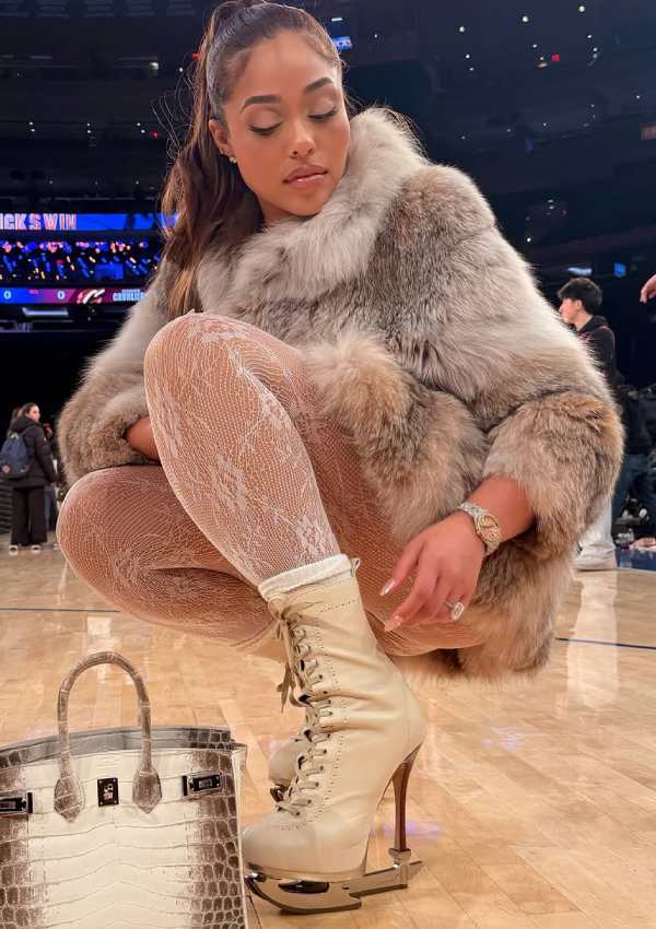 Jordyn Woods Shows Engagement Ring at Christmas Knicks Game