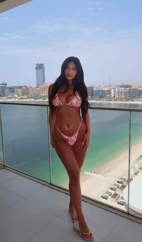 Belle Hassan Flaunts Toned Curves in Floral Bikini During Luxury Dubai Getaway