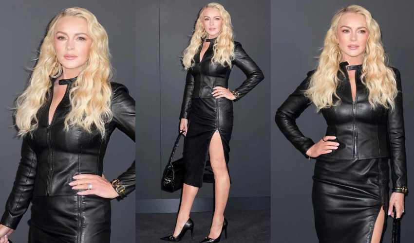 Lindsay Lohan turned heads in an all-black leather Gucci outfit during the Cruise 2027 fashion show in Times Square.