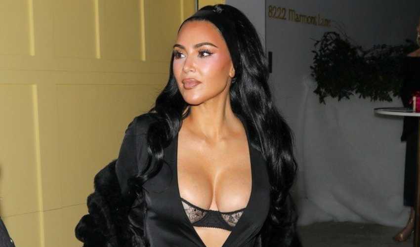 Kim Kardashian Steps Out in Lingerie-Revealing Look at Party